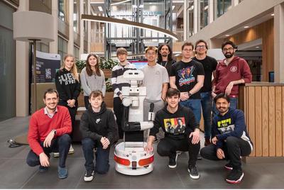 Image of students and their robot.